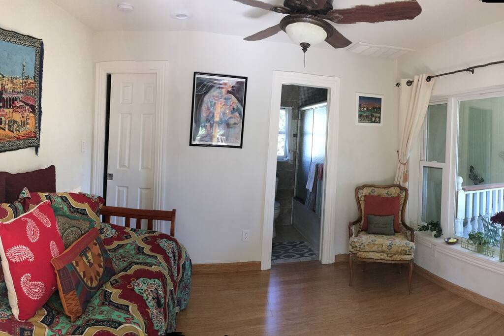 Spacious bamboo floor studio with Twin size bed tundrell for 2, private bathroom shower with toiletries, private closet to hang/store personal items, recessed lighting and ceiling light/fan.