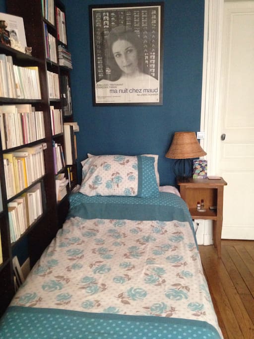 Your lovely bed with plenty of bedtime reading