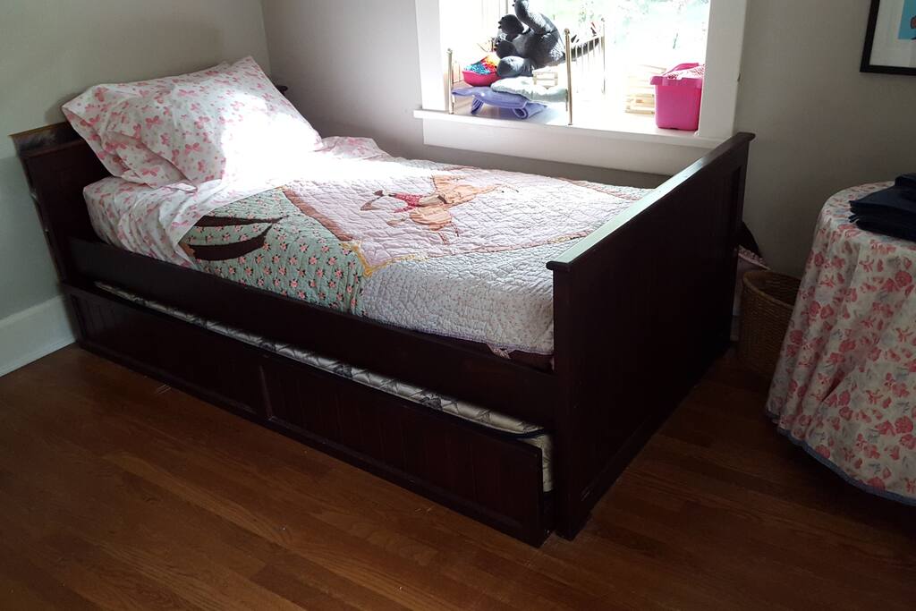 View of Efficiency Room. Shown with twin only. Hard wood floors.