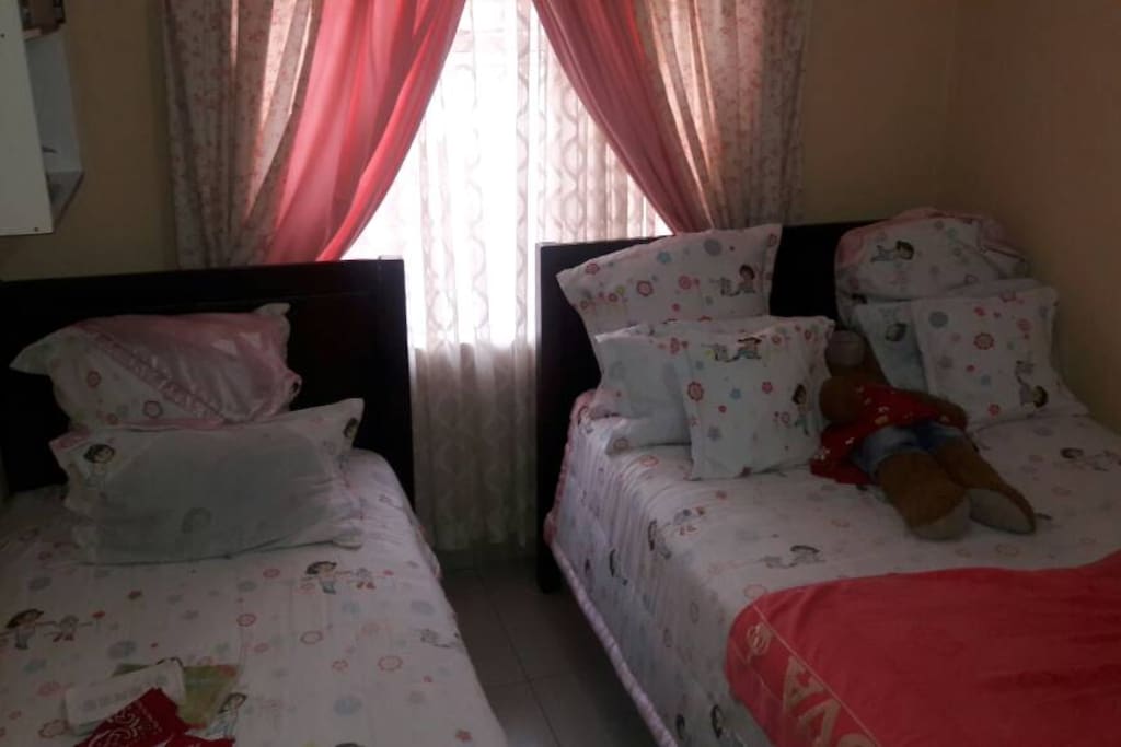 Room with Double and Single Bed