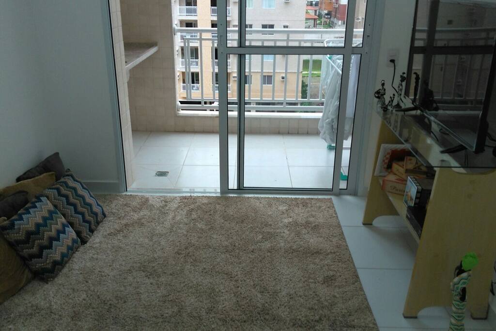 sala de estar e a varanda gourmet