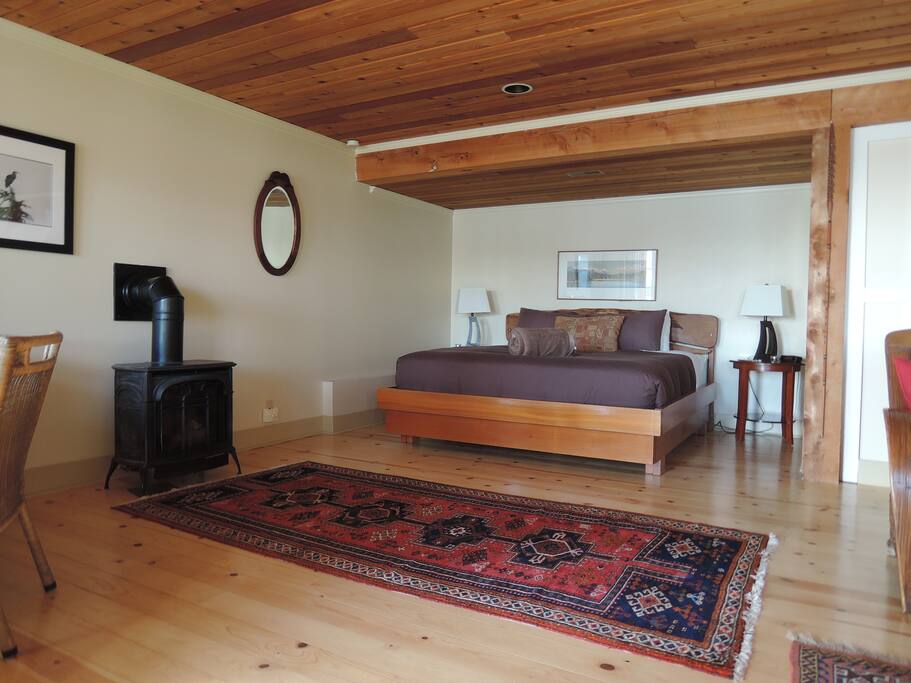 King bed and fireplace.