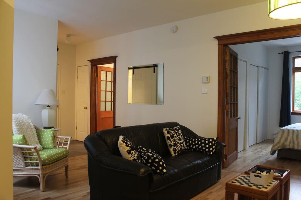 View from both bedrooms; bathroom is left, kitchen and balcony behind.