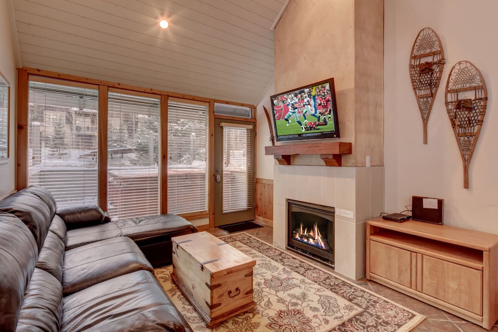 Relax by the fire in the living room