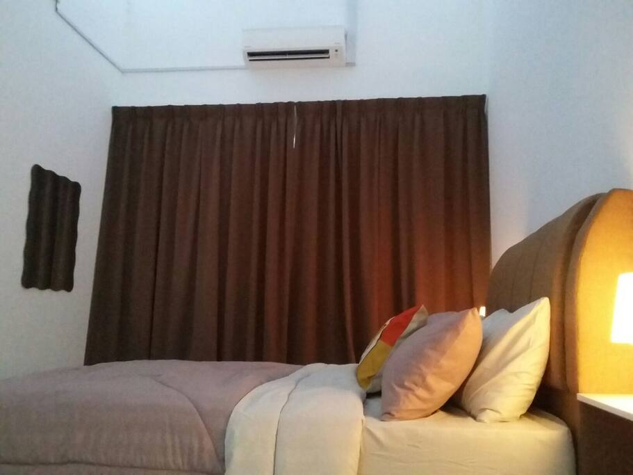 Private room with attached toilet. Airconditioner 1.5hp.
