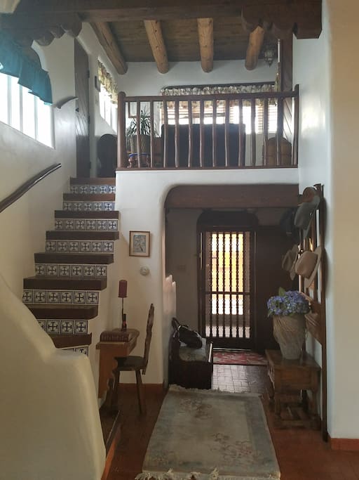 Charming loft with handmade custom Spanish tile. This area is off limits but is a beautiful space to look at.