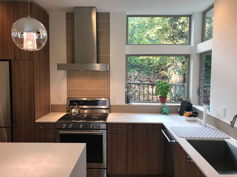 5 burner gas range , dishwasher, microwave