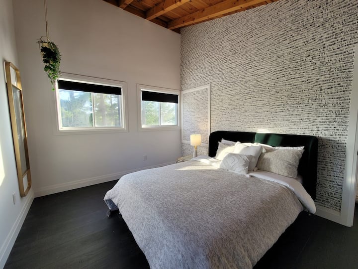 High wood ceilings with East & South Lakeview (2nd bedroom)
Upstairs bedrooms featuring Queen - Juno 