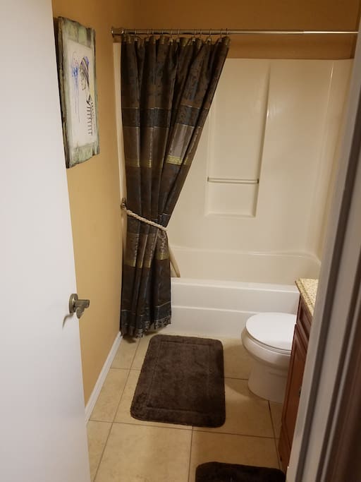 Private (across hall) bathroom w/ towels, washcloths, shampoo, body wash, and TP provided.