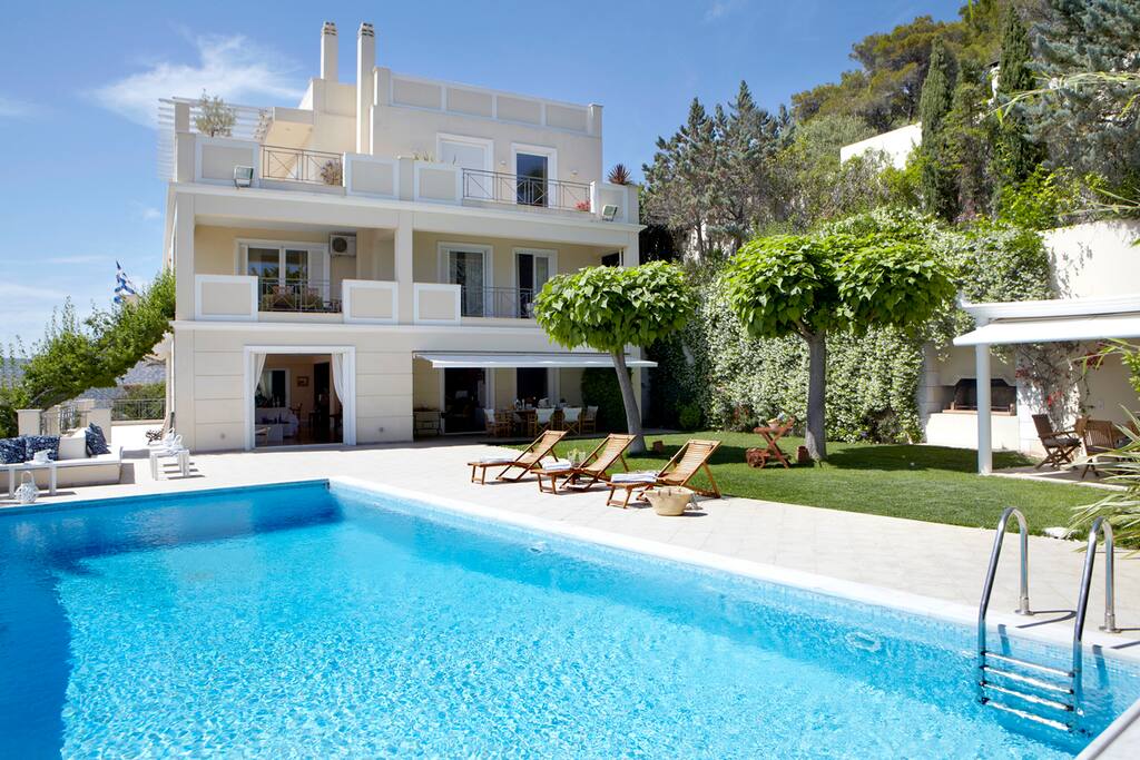 Overall external view of Attica villas from pool. Villa Infinity on ground and 1st floor.