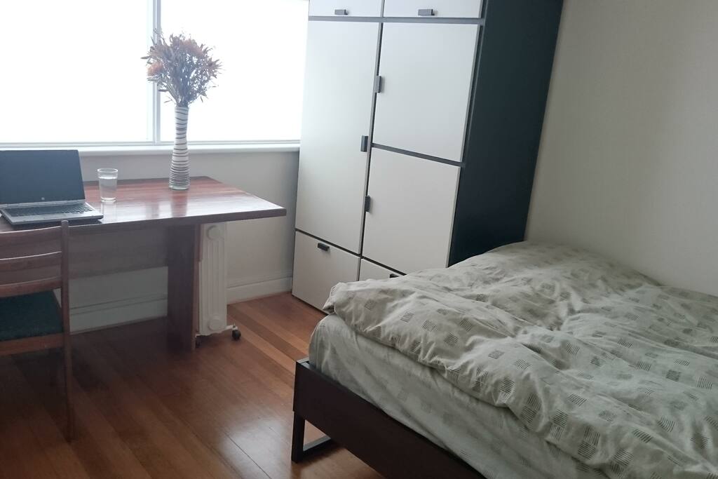 Fully-furnished room with double bed