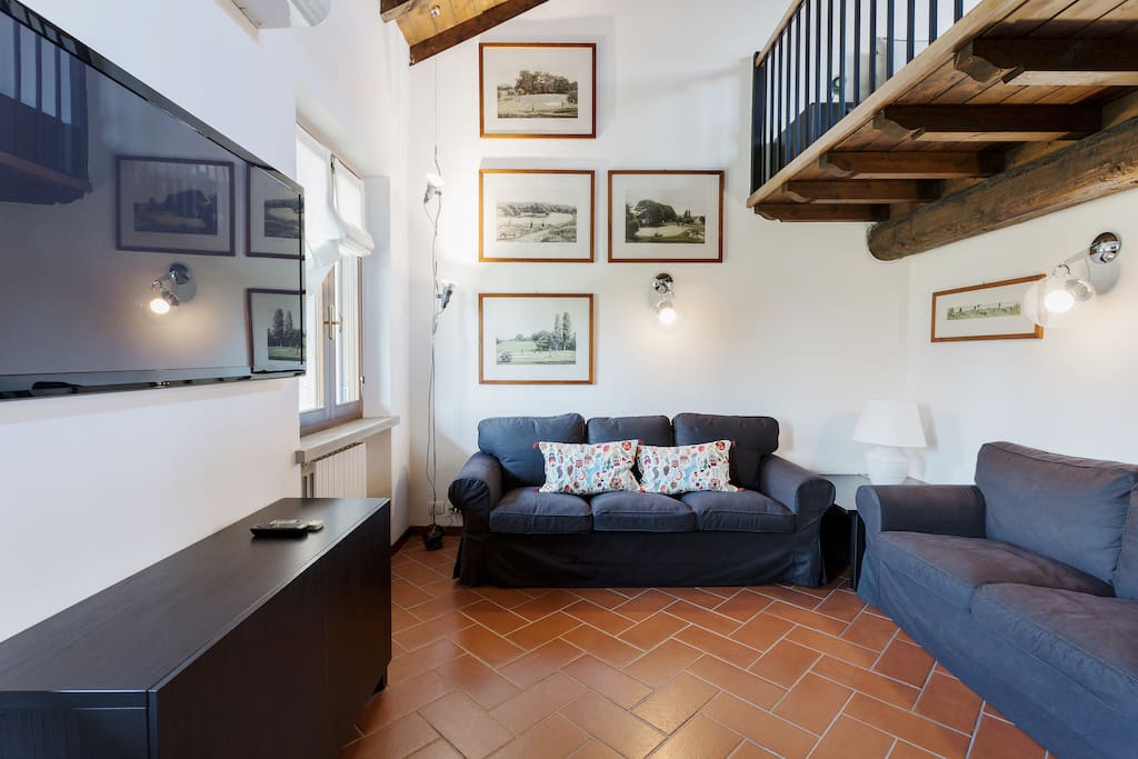 The Living room & The perfect relax area with the sofas & the TV