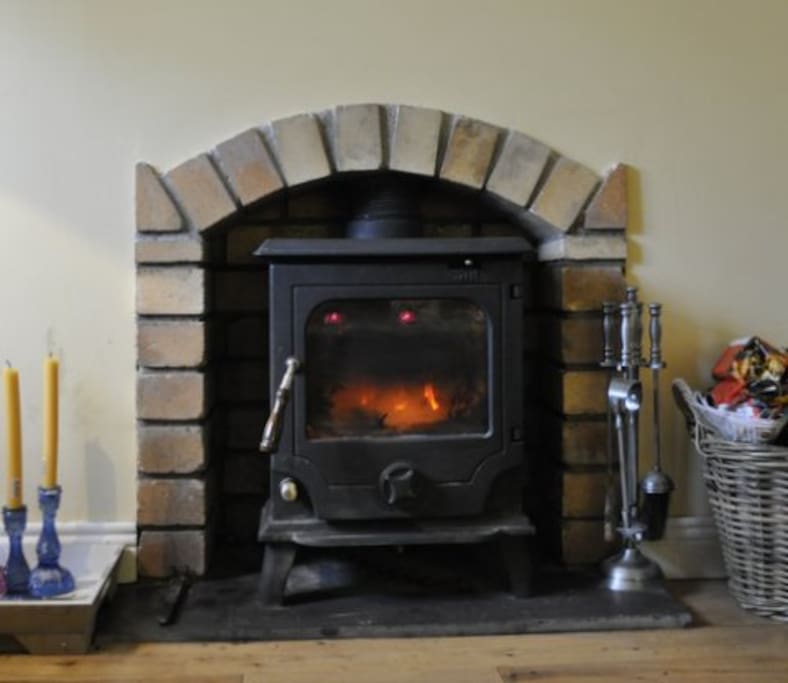Wood burning fire in the living room.