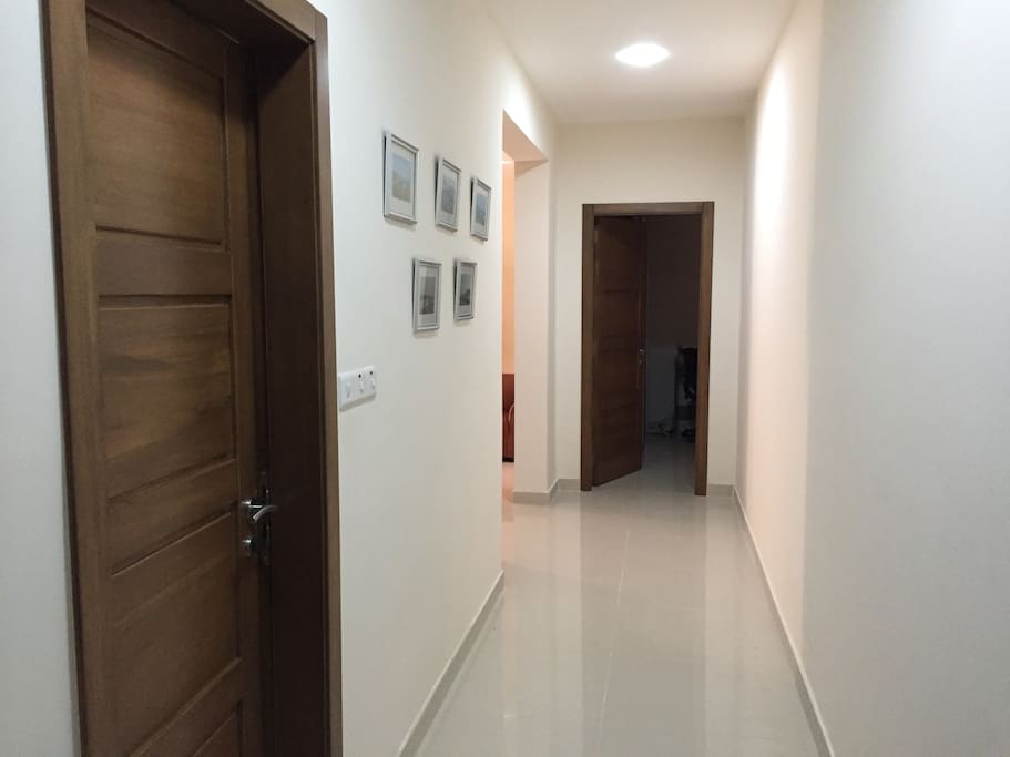 Corridor - Bathroom (left door), 2 bed bedroom (opposite door)