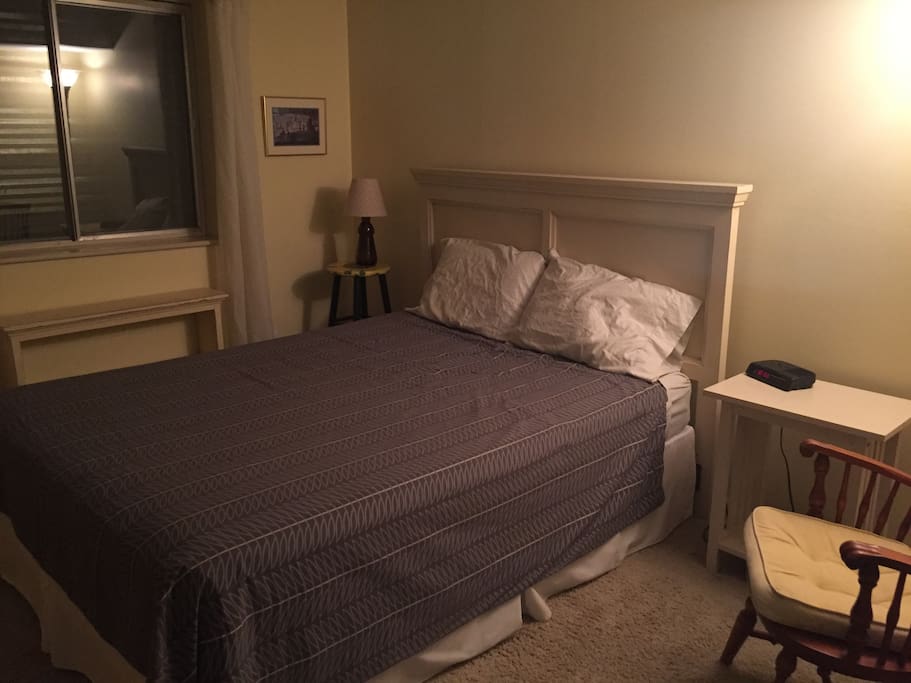 Queensize bed, closet, and luggage nook