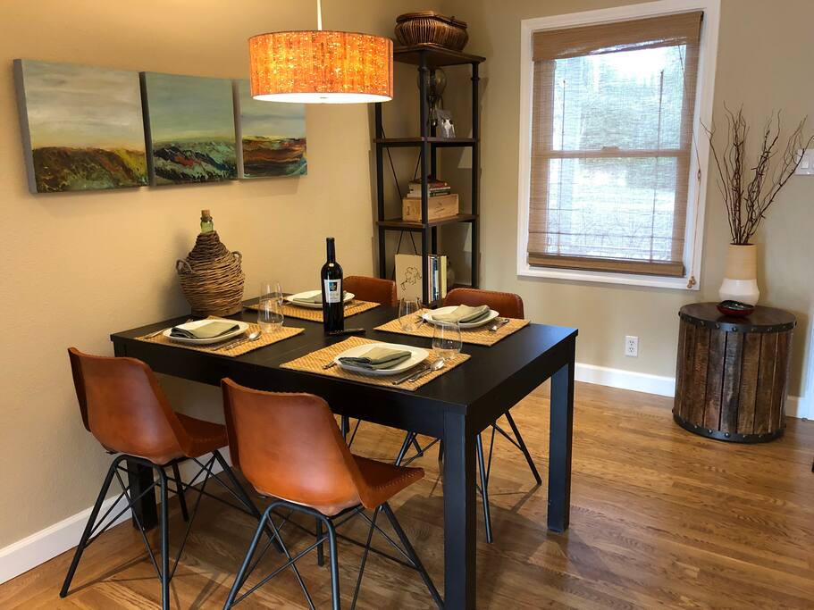 Dining area comfortably seats four. Table expands.