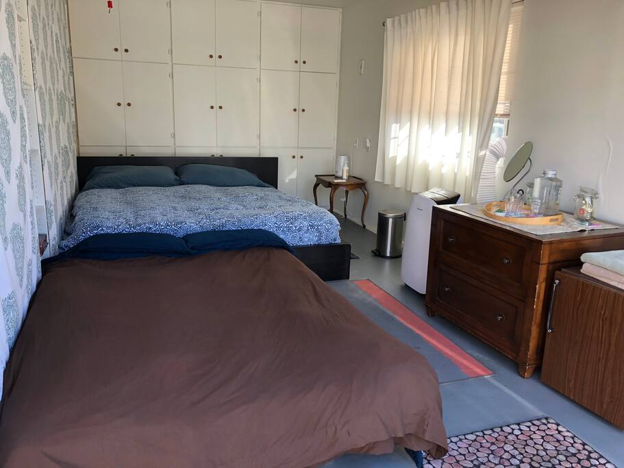 The sofa opens into a second queen-size bed, making the space work for 3 or 4 people.