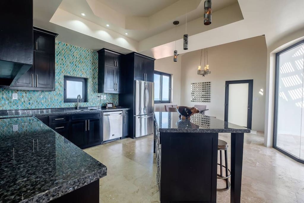Large open kitchen and dining. With additional slider doors all open out to large patio.