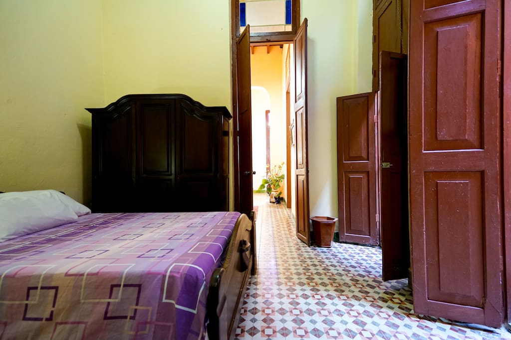 first bedroom with a double bed.