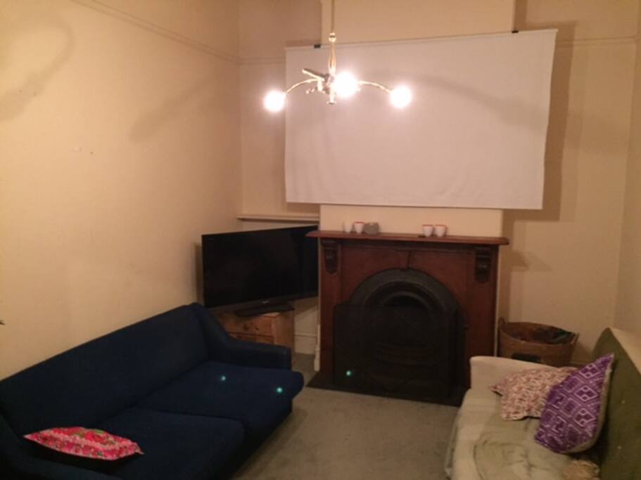 Lounge with cinema projector screen