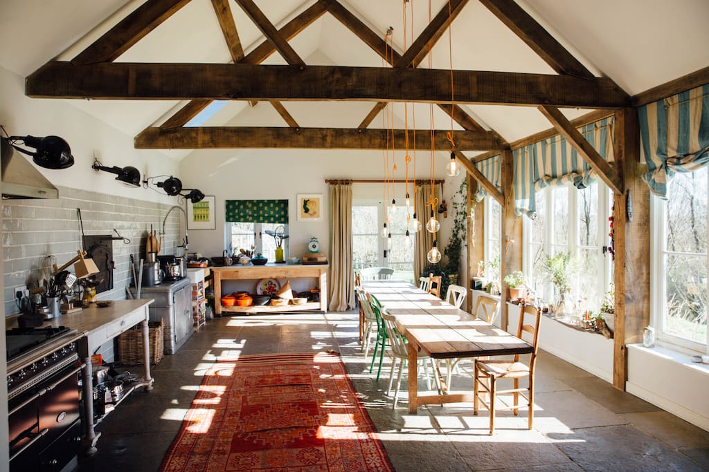 17m long kitchen with sea views, wood fired pizza oven and table to seat 20