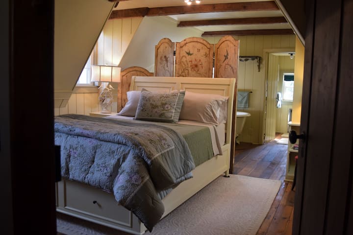 Upstairs bedroom from stair landing doorway - has a lock.