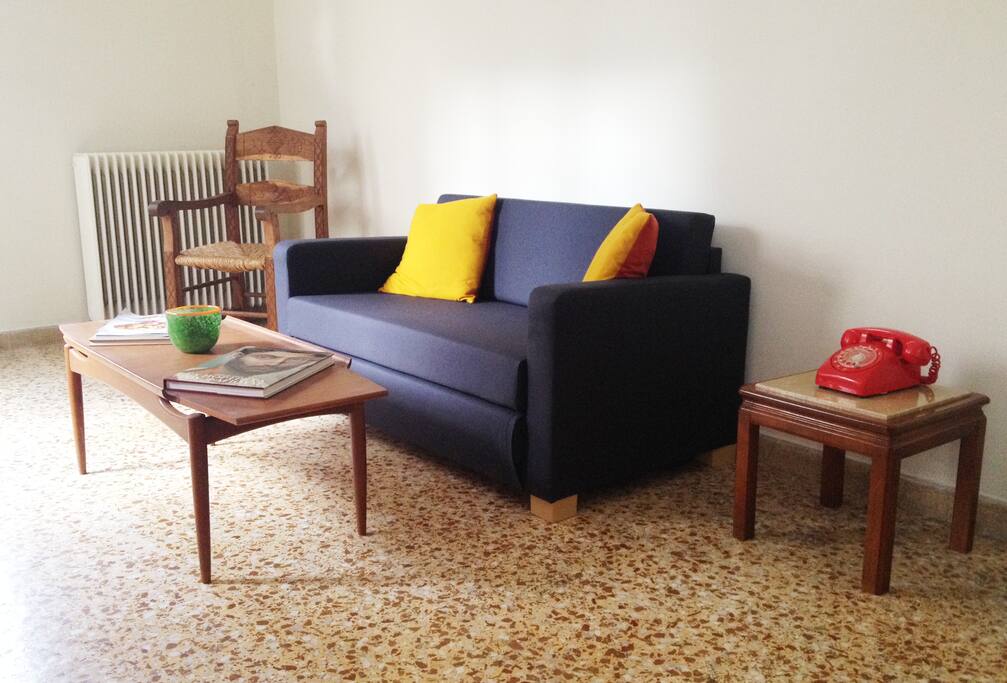 Living area which leads into the dining space.