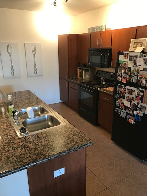 Fully-Equipped Kitchen with kitchen island/breakfast bar