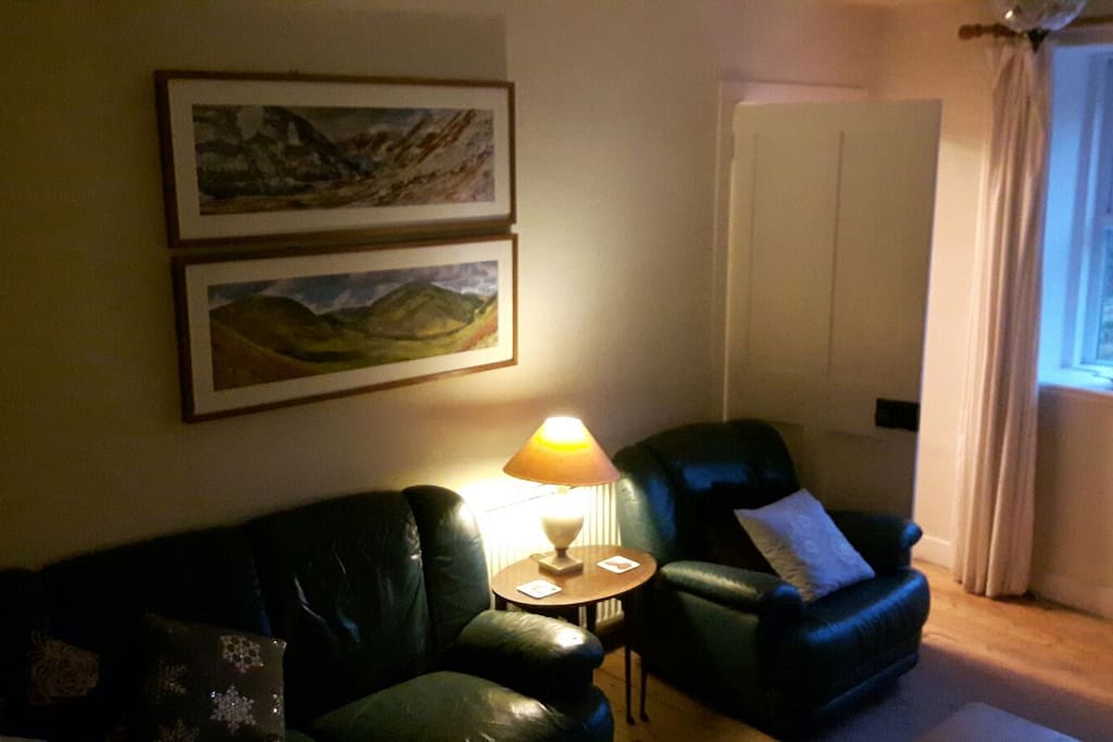 Comfy chairs, great photos and artwork around the house.