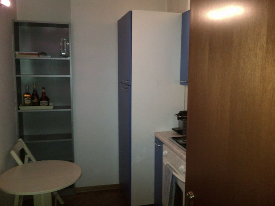 Kitchen (please note table and chairs will be substitued with New ones and current brown door substited with white one)