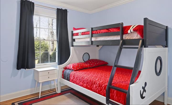 Kids room with Full Bed below and Twin bed above