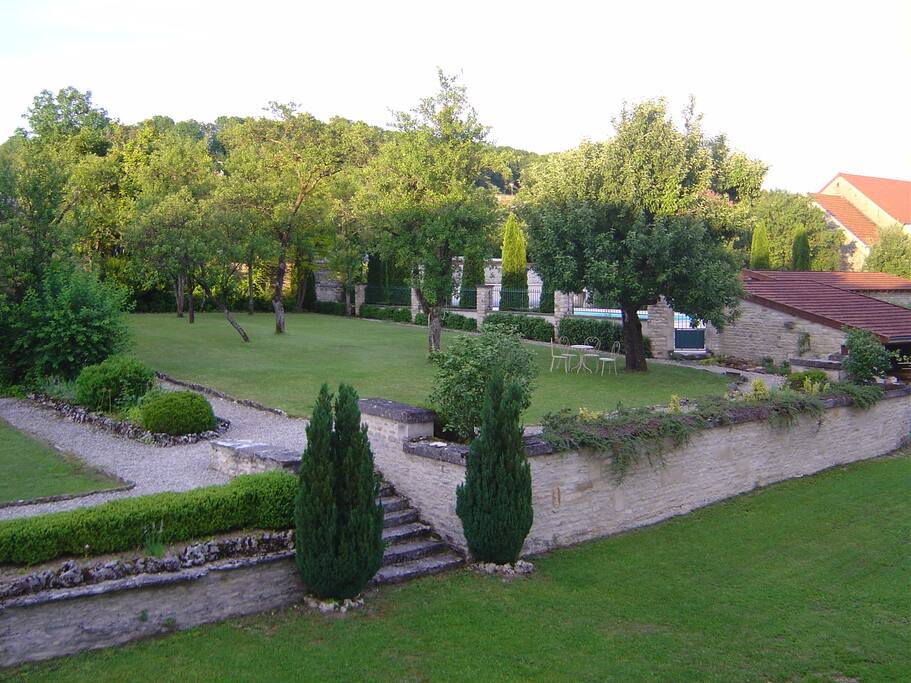 Secluded, walled grounds and two fields to explore through wooden gates