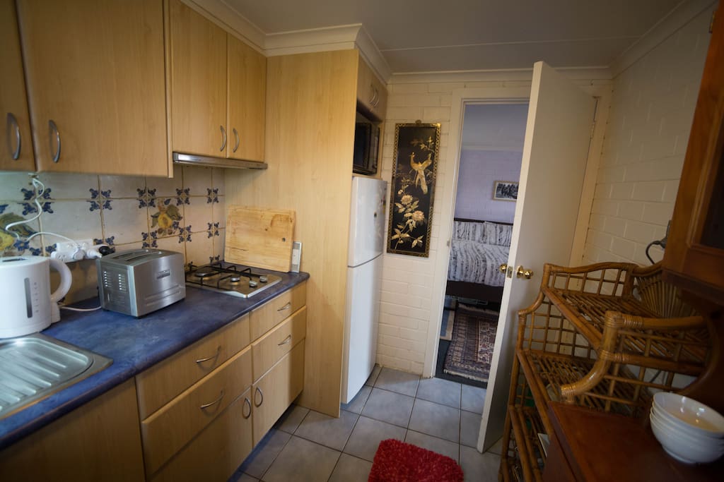 Microwave above fridge, gas cooktop