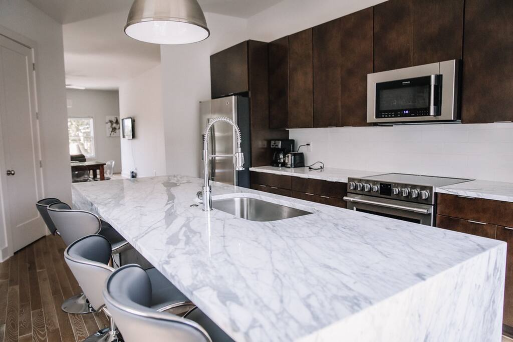 Brand new kitchen fully stocked with all of the essentials for guests to enjoy