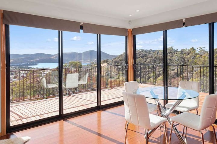 Modern, spacious & sunny home with stunning views.