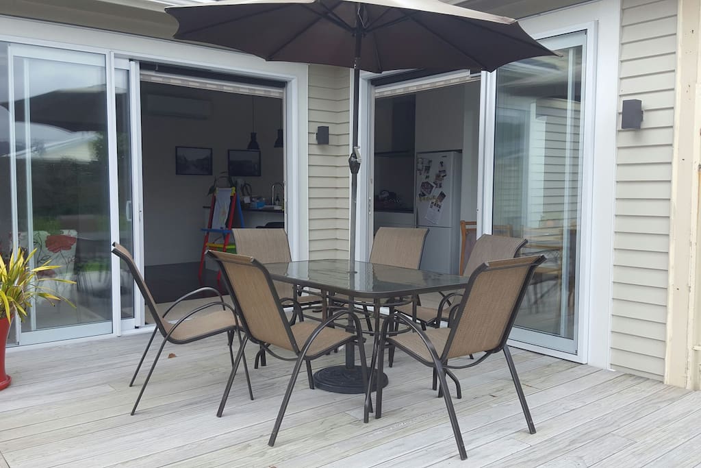 Glass doors slide all the way back to allow for excellent indoor-outdoor flow.