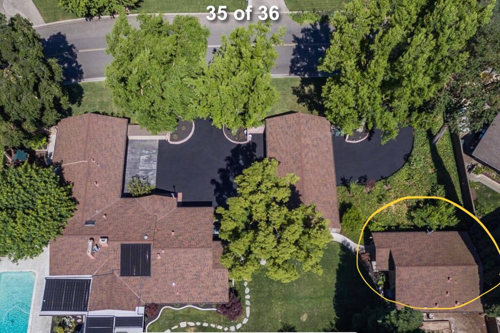 Aerial view. The cottage is circled and has its own path to your own parking space.