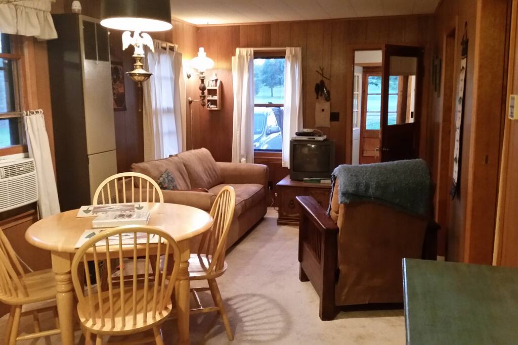 Dining and livingroom view. Sofa pulls out into double bed.