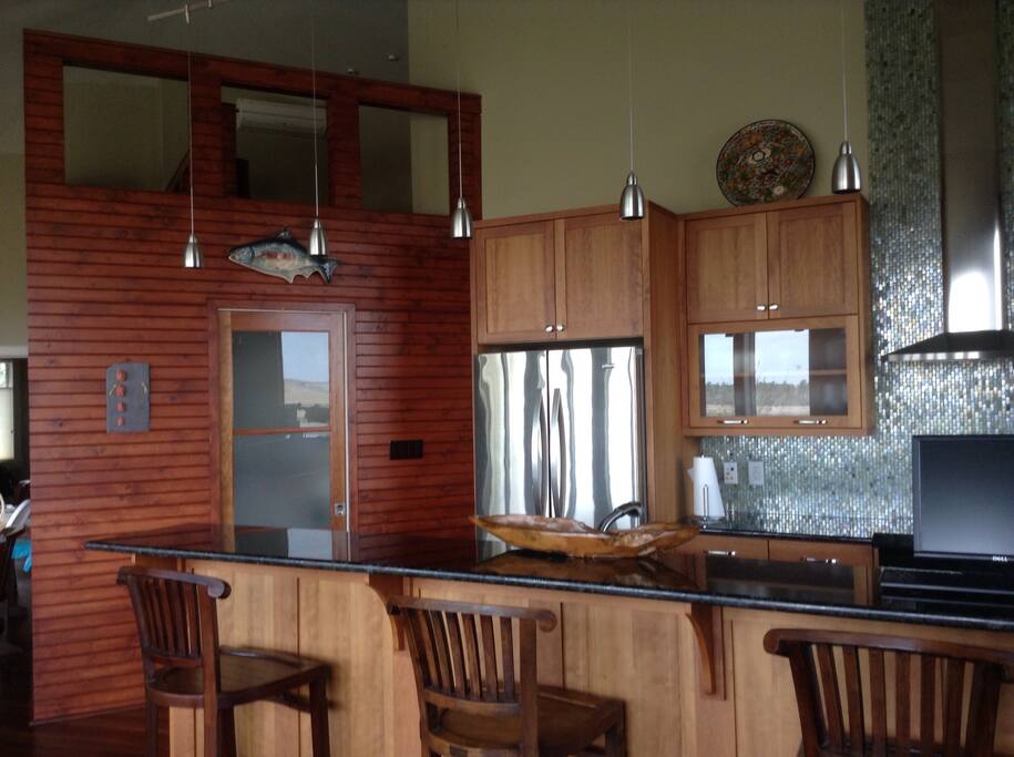 Beautiful kitchen with cherry cabinets, pantry, and all amenities