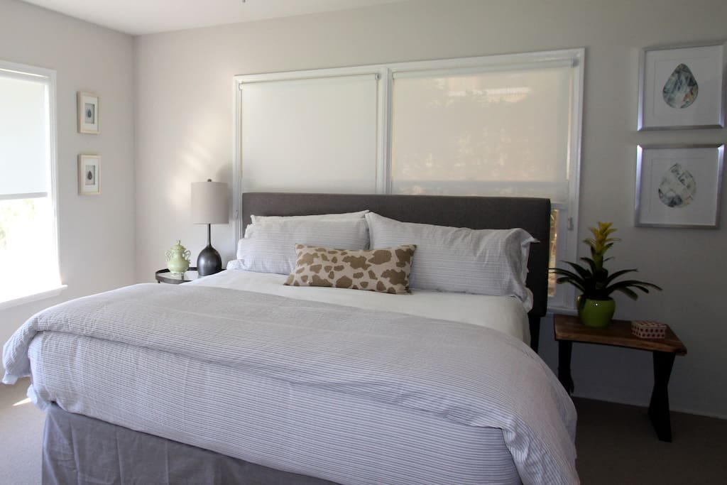 Master bedroom with a king size bed and a pull out sofa-bed