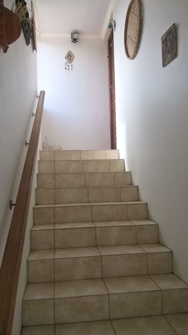 Enclosed staircase to apartment