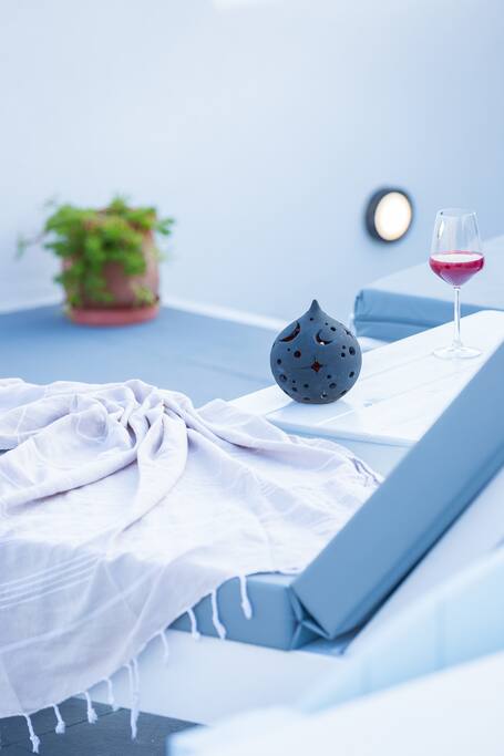 Your private sunbeds and jacuzzi