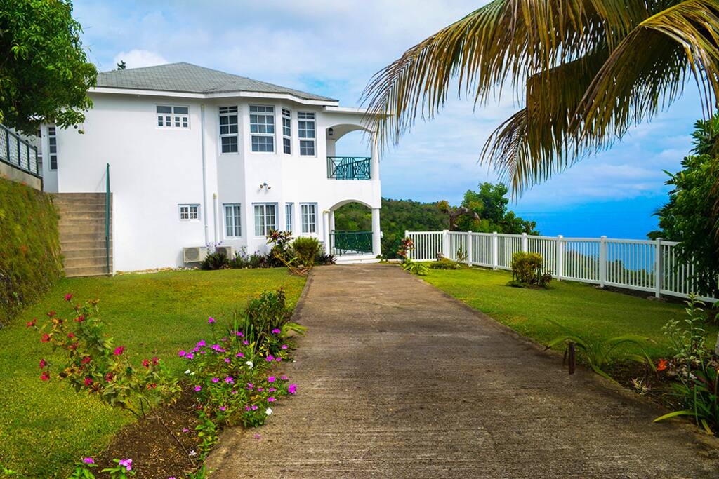 Lower driveway, parking and one of the settings for events such as weddings or parties.