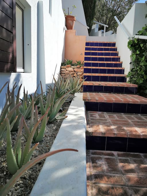 Escaleras de acceso a la vivienda