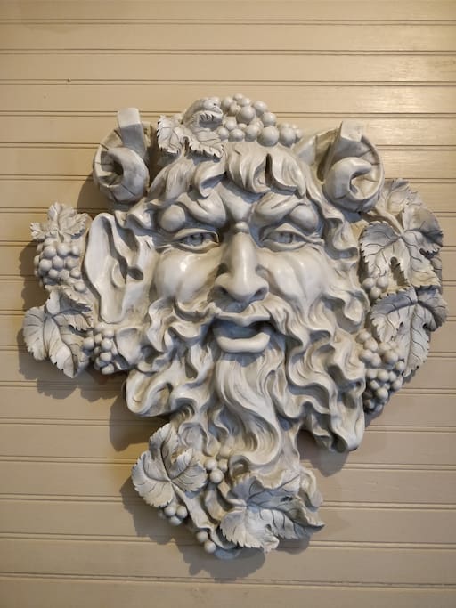 Greek God Bacchus will welcome you at the door