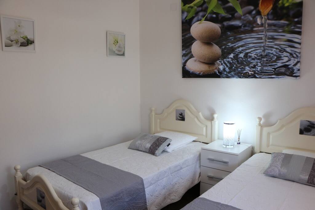 Room with two beds, wardrobes and door that can be locked