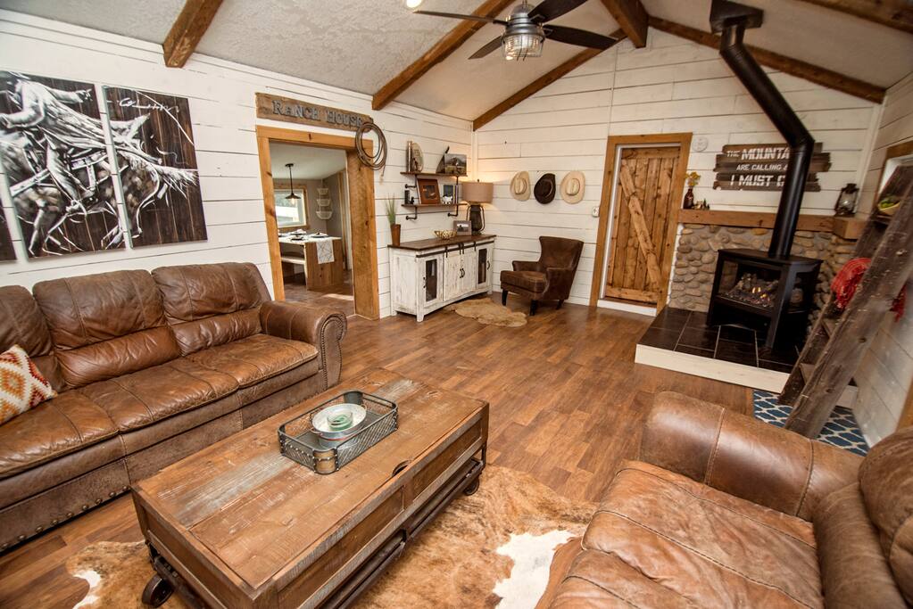 Make yourself at home in the living room with plush, genuine leather couches