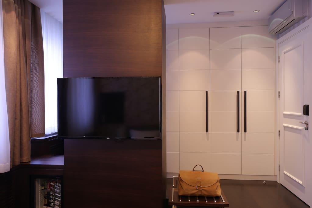 Presidential Suite TV and Storage Area