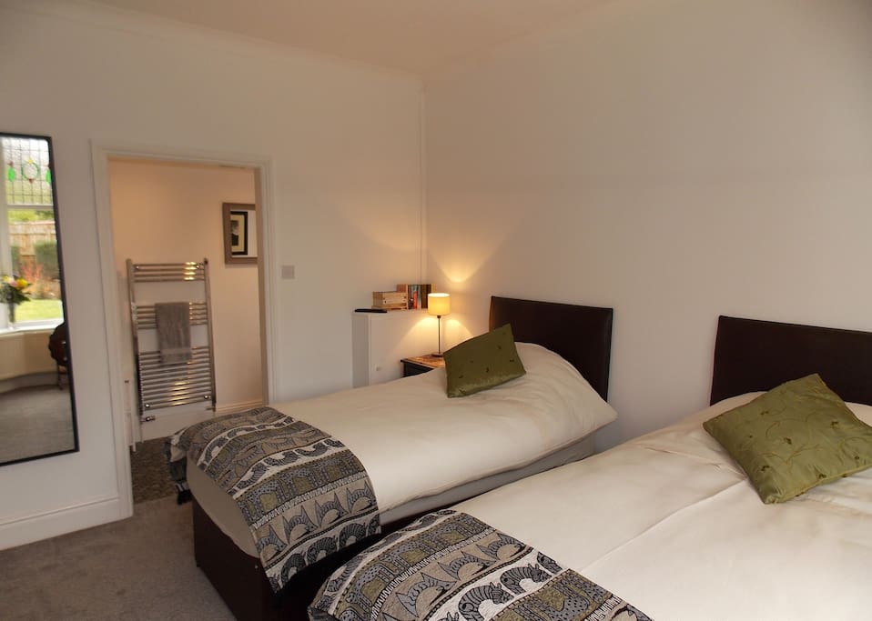 Room set up with twin beds