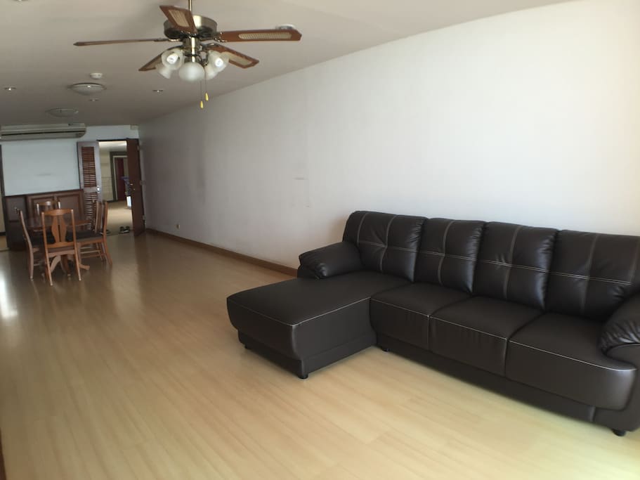 spacious living room. Sea view balcony is beside the sofa.